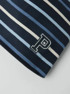 Trikotlue P-applikasjon stripet