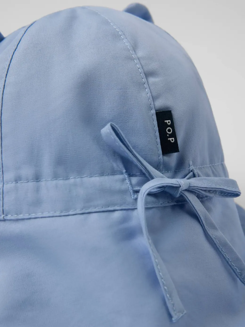 Vevd UV-cap ører